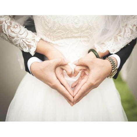 Couple Making Heart with Hands